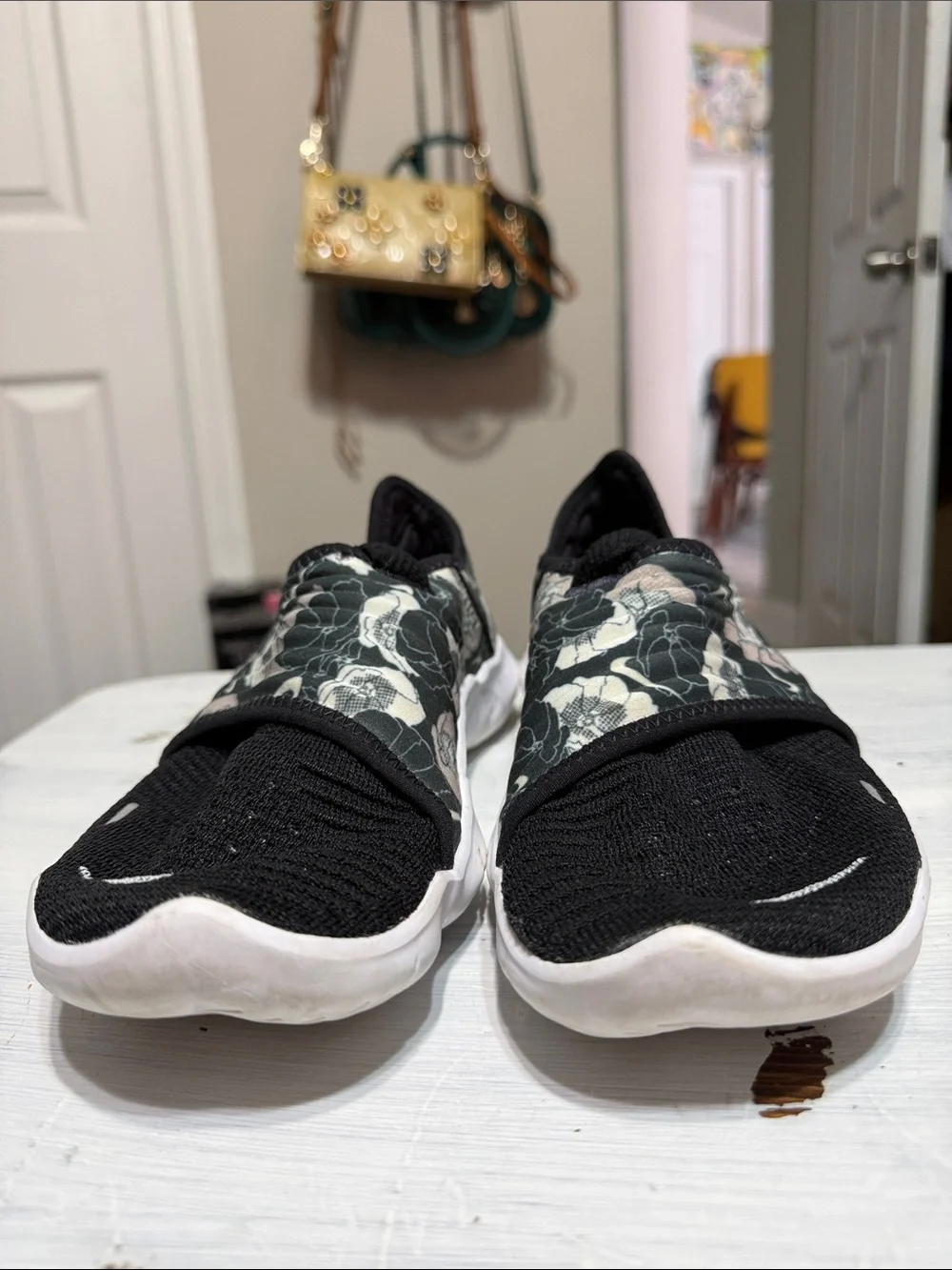 Nike Free RN Flyknit 3.0 sneakers in a black floral colorway size 8